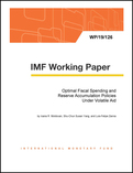 Optimal Fiscal Spending and Reserve Accumulation Policies under Volatile Aid